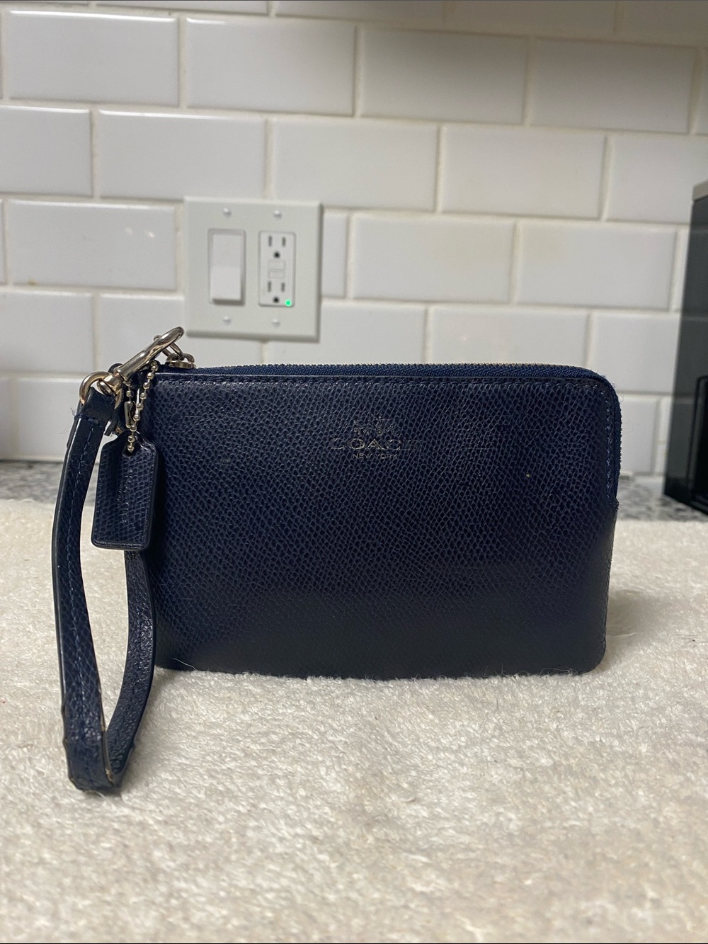 Coach Navy Pebbled Leather Wristlet with Gold Hardware
